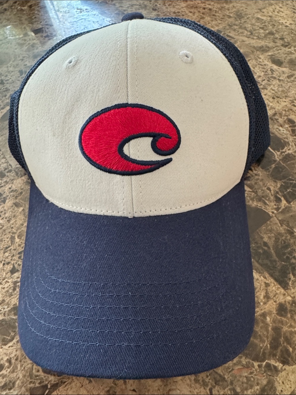 Costa Navy & White Trucker Hat with Red Wave Logo